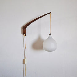 Scandinavian teak and glass wall lamp design by Uno & Östen Kristiansson